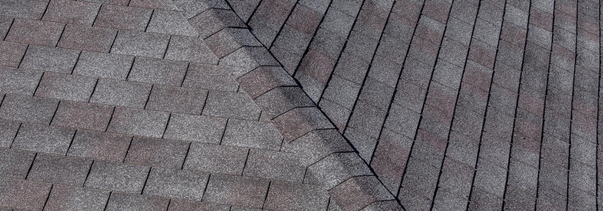 Aerial view of grey asphalt roof shingles