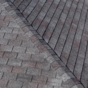Aerial view of grey asphalt roof shingles